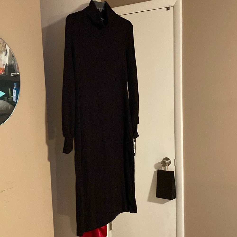 Bebe Large Fitting Dress! Never Worn, has tags! Very very cute!